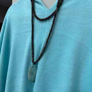 Fabulina brand multi strand bronze colored glass faceted bead necklace.